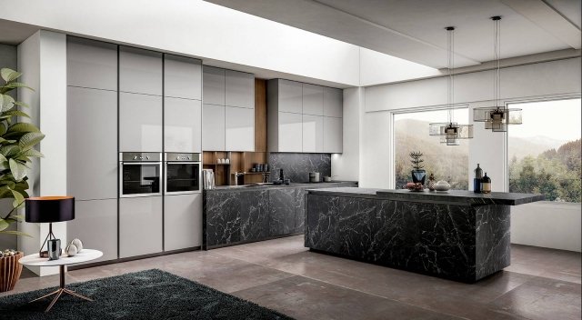 Zetasei di Arredo3 è la cucina con il top extra in laminato in una ricercata e raffinata versione effetto pietra nero, caratterizzato da eleganti venature bianche, ripreso nelle basi e nello schienale: è resistente e facile da pulire, ma anche molto scenografico. Crea un piacevole contrasto con il laminato eucalipto noce degli elementi a giorno e il laccato lucido grigio topo delle colonne e dei pensili. Prezzo su richiesta. www.arredo3.it Zetasei di Arredo3 è la cucina con il top extra in laminato in una ricercata e raffinata versione effetto pietra nero, caratterizzato da eleganti venature bianche, ripreso nelle basi e nello schienale: è resistente e facile da pulire, ma anche molto scenografico. Crea un piacevole contrasto con il laminato eucalipto noce degli elementi a giorno e il laccato lucido grigio topo delle colonne e dei pensili. Prezzo su richiesta. www.arredo3.it
