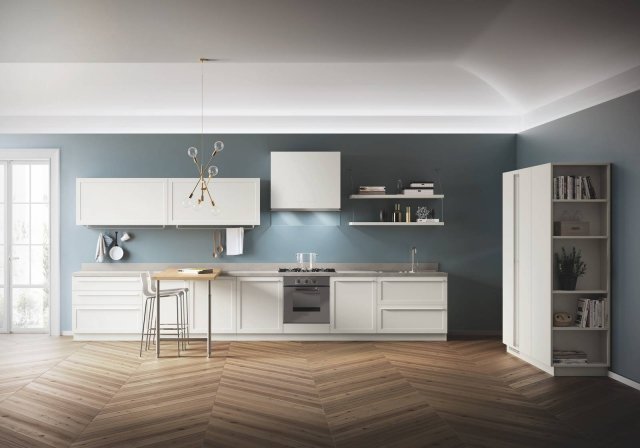 Carattere di Scavolini ha le ante lisce con la maniglia in tinta che sottolinea le dimensioni del telaio trasformandolo in un elemento décor; il top è in laminato Vertigo. La grande cappa Funzione è montata a parete e caratterizzata da un dettaglio in vetro trasparente; il bancone a sbalzo è impiallacciato Rovere Nordic con gambe in acciaio. Prezzo su richiesta. www.scavolini.com Carattere di Scavolini ha le ante lisce con la maniglia in tinta che sottolinea le dimensioni del telaio trasformandolo in un elemento décor; il top è in laminato Vertigo. La grande cappa Funzione è montata a parete e caratterizzata da un dettaglio in vetro trasparente; il bancone a sbalzo è impiallacciato Rovere Nordic con gambe in acciaio. Prezzo su richiesta. www.scavolini.com