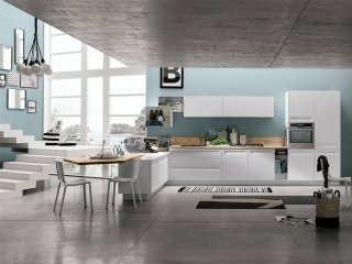 cucina con penisola e piano in laminato rovere wafer Rewind di Stosa cucina con penisola e piano in laminato rovere wafer Rewind di Stosa