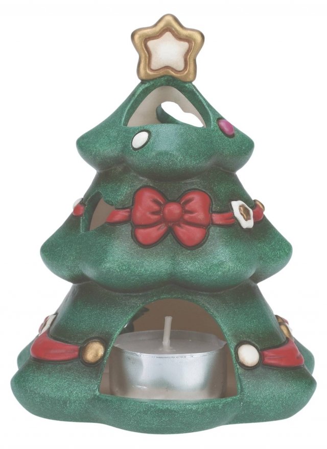 Il porta tea-light Albero di Natale di Thun è realizzato in ceramica colorata e permette di illuminare magicamente i giorni di festa: può essere sistemato sulla tavola delle feste o davanti ad una finestra. Misura H 12 cm. Prezzo 29,90 euro. www.thun.it Il porta tea-light Albero di Natale di Thun è realizzato in ceramica colorata e permette di illuminare magicamente i giorni di festa: può essere sistemato sulla tavola delle feste o davanti ad una finestra. Misura H 12 cm. Prezzo 29,90 euro. www.thun.it