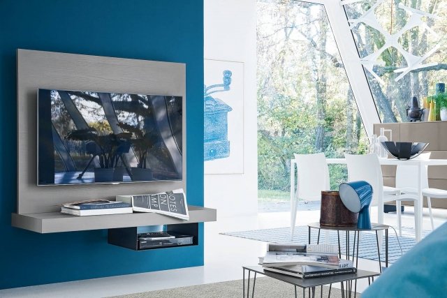 La spalla portatv con mensola integrata diventa il punto focale dell’intera parete nel living. Con finitura frassino laccato opaco, il pannello di Febal Casa è completo di piano d’appoggio e contenitore sottostante per attrezzature varie. Misura L 120 x P 49 x H 8 cm e costa 914 euro. www.febalcasa.com La spalla portatv con mensola integrata diventa il punto focale dell’intera parete nel living. Con finitura frassino laccato opaco, il pannello di Febal Casa è completo di piano d’appoggio e contenitore sottostante per attrezzature varie. Misura L 120 x P 49 x H 8 cm e costa 914 euro. www.febalcasa.com