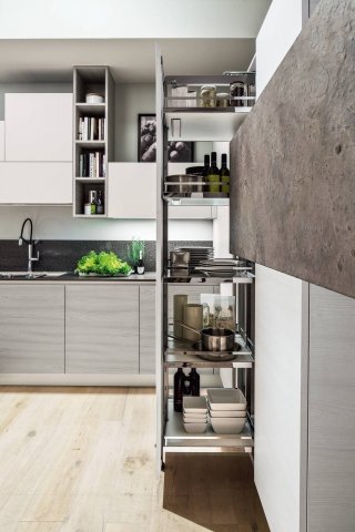 composizione cucina formata con modelli Mango (con ante in laminato frassinato) e Roccia (realizzato con fogli di vera roccia ricostruita con l'utilizzo di resine) di Arrex Le Cucine composizione cucina formata con modelli Mango (con ante in laminato frassinato) e Roccia (realizzato con fogli di vera roccia ricostruita con l'utilizzo di resine) di Arrex Le Cucine