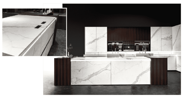 Grazie a Zone a induzione invisibili (nascoste sotto il top) il piano di lavoro rimane perfettamente liscio, uniforme e facile da pulire. In più, quando non si cucina, la superficie è totalmente fruibile.
Vesta di Binova (www.binova.it), con piano cottura Empatia, ha ante con telaio in alluminio Piombo e lastre in gres Statuario Altissimo (come il top) e stratificate impiallacciate Eucalipto Scuro. Pensili e vani a giorno multifunzione, sul piano di lavoro, consentono un facile accesso alle attrezzature. Prezzo da rivenditore. Grazie a Zone a induzione invisibili (nascoste sotto il top) il piano di lavoro rimane perfettamente liscio, uniforme e facile da pulire. In più, quando non si cucina, la superficie è totalmente fruibile.
Vesta di Binova (www.binova.it), con piano cottura Empatia, ha ante con telaio in alluminio Piombo e lastre in gres Statuario Altissimo (come il top) e stratificate impiallacciate Eucalipto Scuro. Pensili e vani a giorno multifunzione, sul piano di lavoro, consentono un facile accesso alle attrezzature. Prezzo da rivenditore.