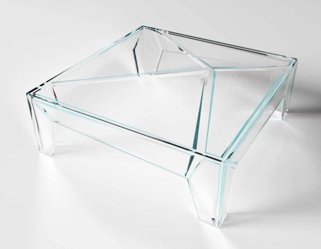 Hypertable di Glas Italia, design Mario Bellini, è il tavolo basso in cristallo trasparente extralight incollato a 45°. Sulla superficie inferiore sono state applicate lastre di cristallo extralight con forme irregolari, i cui bordi presentano biselli diversi tra loro: il risultato è un tavolo che sembra formato da un insieme di prismi che creano riflessi e giochi di luce. Misura L 120 x P 120 x H 42 cm. www.glasitalia.com Hypertable di Glas Italia, design Mario Bellini, è il tavolo basso in cristallo trasparente extralight incollato a 45°. Sulla superficie inferiore sono state applicate lastre di cristallo extralight con forme irregolari, i cui bordi presentano biselli diversi tra loro: il risultato è un tavolo che sembra formato da un insieme di prismi che creano riflessi e giochi di luce. Misura L 120 x P 120 x H 42 cm. www.glasitalia.com