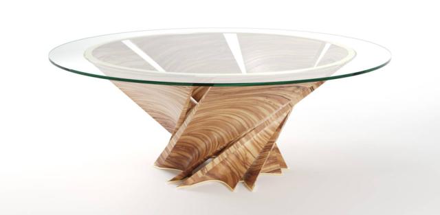 Torsion Table di Natuzzi Italia, design Mario Bellini, è il tavolo rotondo imponente e scenografico, formato dalla base composta da sei petali in massello di ulivo che si intrecciano sormontata da un piano in vetro extrachiaro. Le dimesnioni e la forma lo rendono simile ad una scultura contemporanea. www.natuzzi.it Torsion Table di Natuzzi Italia, design Mario Bellini, è il tavolo rotondo imponente e scenografico, formato dalla base composta da sei petali in massello di ulivo che si intrecciano sormontata da un piano in vetro extrachiaro. Le dimesnioni e la forma lo rendono simile ad una scultura contemporanea. www.natuzzi.it