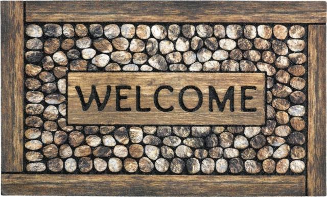 Eco Master Welcome Framed Pebbles di Sitap è decorato da ciottoli e sassolini con una cornice in legno e una scritta decorativa. Il grande zerbino è interamente fatto con gomma riciclata, resistente e facile da pulire. Misura L 75 x P 45 cm. Prezzo 46,36 euro. www.sitap.it Eco Master Welcome Framed Pebbles di Sitap è decorato da ciottoli e sassolini con una cornice in legno e una scritta decorativa. Il grande zerbino è interamente fatto con gomma riciclata, resistente e facile da pulire. Misura L 75 x P 45 cm. Prezzo 46,36 euro. www.sitap.it