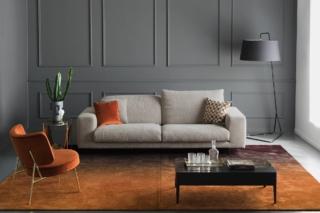 Divano facing con cuscini regolabili e linee semplici