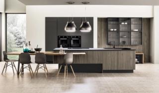 cucina aperta sul living a gola Primavera di Arrex con ante in laminato legno colore origano cucina aperta sul living a gola Primavera di Arrex con ante in laminato legno colore origano