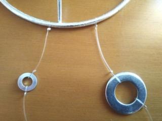 Fissate tutte le file di rondelle alla base con filo e schiaccini.