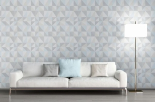 Una fantasia geometrica declnata nelle delicate tonalità pastello per la superficie della carta da parati in vinile 351813 A.S. Création Björn in vendita da Bricoflor. Sta bene accostata ad un divano bianco con cuscini azzurri e grigio chiaro che riprendono le nuances sulla parete. Misura L 10,05 x H 0,53 metri. Prezzo 19,95 euro/rotolo. www.bricoflor.it