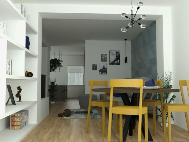 Soggiorno con zona pranzo con sedie gialle libreria bianca e carta da parati azzurra grigia. E' un Soggiorno con zona pranzo vicino alla terrazza con lavanderia Soggiorno con zona pranzo con sedie gialle libreria bianca e carta da parati azzurra grigia. E' un Soggiorno con zona pranzo vicino alla terrazza con lavanderia