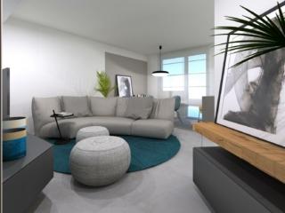 divano e pouf grigio in soggiorno a pianta irregolare divano e pouf grigio in soggiorno a pianta irregolare