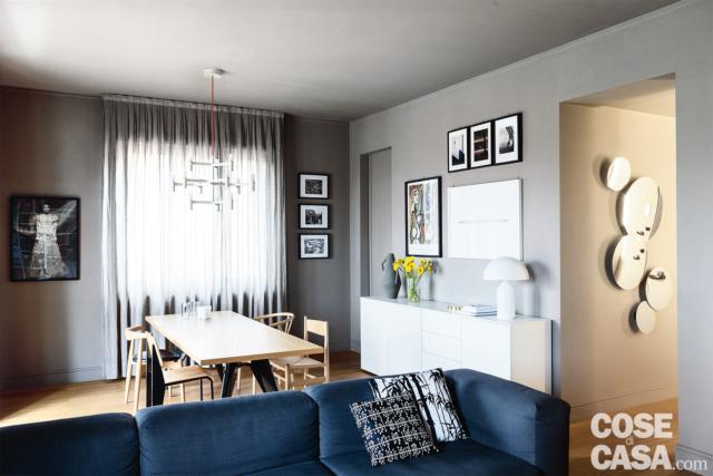 bilocale, zona pranzo, finestra, tavolo rettangolare, sedie in stile nordico, sospensione di design, mobile in laccato bianco, lampada da tavolo bilocale, zona pranzo, finestra, tavolo rettangolare, sedie in stile nordico, sospensione di design, mobile in laccato bianco, lampada da tavolo