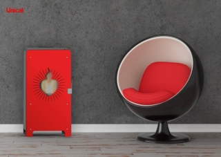 Stufa TUA di Unical HEART_ROSSO_poltrona Stufa TUA di Unical HEART_ROSSO_poltrona