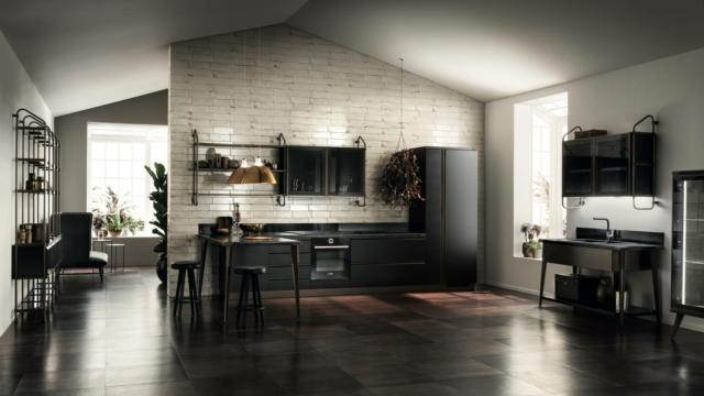 DieselOpenWorkshop di Scavolini è la cucina in stile industrial caratterizzata dalle ante in Laccato Opaco Nero Ardesia illuminate dagli elementi verniciati nella finitura Bronzo DieselOpenWorkshop di Scavolini è la cucina in stile industrial caratterizzata dalle ante in Laccato Opaco Nero Ardesia illuminate dagli elementi verniciati nella finitura Bronzo