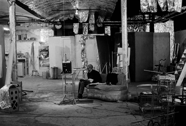 Factory Panorama with Andy Warhol seated on couch in center of legendary Silver Factory studio space, circa 1965. Photograph by Nat Finkelstein. Factory Panorama with Andy Warhol seated on couch in center of legendary Silver Factory studio space, circa 1965. Photograph by Nat Finkelstein.