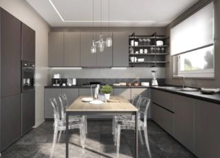 Due tonalità di grigio per le ante lisce, con apertura a gola, realizzate in PET seta, delle basi e dell e colonne che caratterizzano la cucina Pratica 2004 di La Casa Moderna. Il top e lo schienale sono in laminato effetto pietra color lavagna come gli zoccoli. La boiserie in laccato opaco è dotata di staffe in metallo e luci led. Un modulo base da 60 cm con anta, prezzo a partire da 305 euro. http://www.lacasamoderna.com Due tonalità di grigio per le ante lisce, con apertura a gola, realizzate in PET seta, delle basi e dell e colonne che caratterizzano la cucina Pratica 2004 di La Casa Moderna. Il top e lo schienale sono in laminato effetto pietra color lavagna come gli zoccoli. La boiserie in laccato opaco è dotata di staffe in metallo e luci led. Un modulo base da 60 cm con anta, prezzo a partire da 305 euro. http://www.lacasamoderna.com