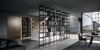 Una solida struttura in ferro nero per l'ampia libreria bifacciale Unlimited di Modulnova che si può articolare con un numero di spalle e di ripiani a scelta; ogni singola spalla può essere fissata a soffitto con regolazione a spinta. I ripiani si possono scegliere fra dodici finiture diverse, dal gres al laminato passando per il laccato satinato e il vetro fumé. Prezzo su richiesta. www.modulnova.it Una solida struttura in ferro nero per l'ampia libreria bifacciale Unlimited di Modulnova che si può articolare con un numero di spalle e di ripiani a scelta; ogni singola spalla può essere fissata a soffitto con regolazione a spinta. I ripiani si possono scegliere fra dodici finiture diverse, dal gres al laminato passando per il laccato satinato e il vetro fumé. Prezzo su richiesta. www.modulnova.it