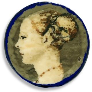 Venezia, Museo del Vetro, Murrina con volto femminile. Venezia, Museo del Vetro, Murrina con volto femminile.