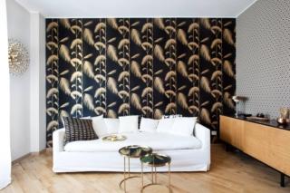 Il divano e la carta da parati Il divano e la carta da parati