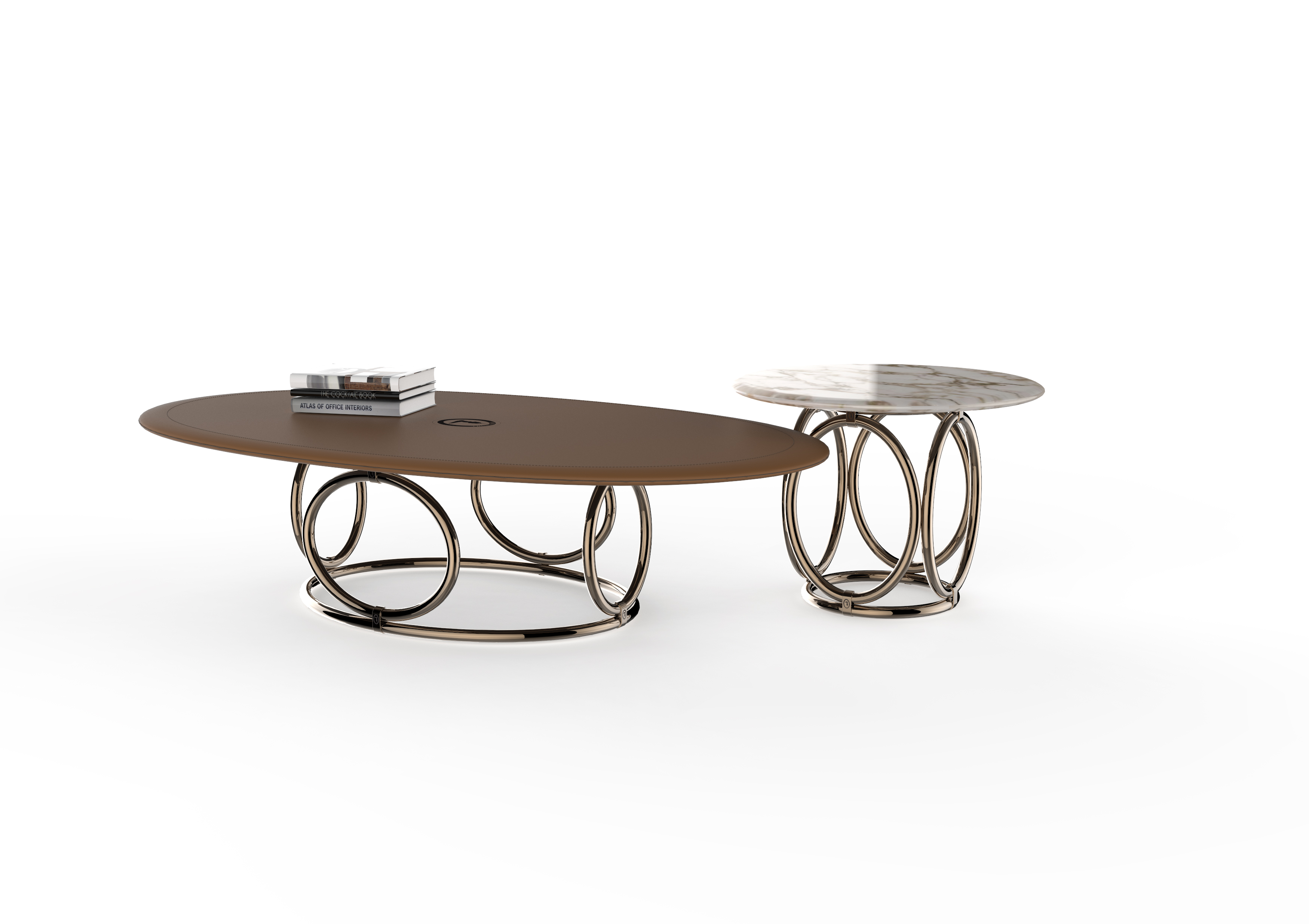 La famiglia Oval (design Carlo Colombo) di Trussardi Casa prende nome dall’ovale di metallo mutuato dal logo della maison e riproposto tridimensionalmente in ogni arredo e comprende poltrona, pouf, sedia, coffee e side table. I tavolini, in due dimensioni e altezze, sfruttano la ripetizione della forma geometrica nella base d’appoggio, elegantemente declinata in una inedita finitura galvanica. Impreziositi dalle finiture dei piani d’appoggio, questi arredi di segno assolutamente contemporaneo si ispirano agli stilemi informali e dinamici che contraddistinguono le collezioni della casa di moda milanese. www.trussardi.com