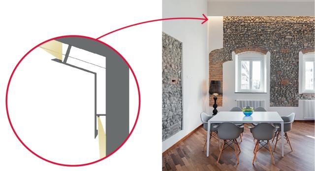 sistema di illuminazione wall-washer lungo la parete in pietra del soggiorno sistema di illuminazione wall-washer lungo la parete in pietra del soggiorno