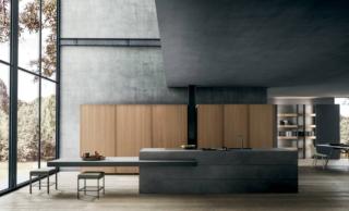 L'isola monolitica, con le ante nella finitura Dark Depth e il top in gres grigio effetto calce, mette in risalto la matericità e il calore del legno delle colonne impiallacciate Noce Milano nella cucina Twenty Frame di Modulnova. Prezzo su richiesta. www.modulnova.it L'isola monolitica, con le ante nella finitura Dark Depth e il top in gres grigio effetto calce, mette in risalto la matericità e il calore del legno delle colonne impiallacciate Noce Milano nella cucina Twenty Frame di Modulnova. Prezzo su richiesta. www.modulnova.it