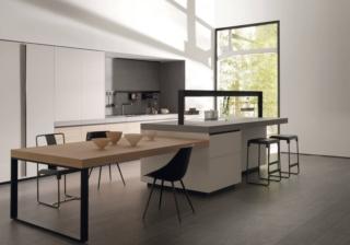 Pregiato Olmo Tattile per le ante delle basi nella composizione Genius Loci di Valcucine che sono in grado, grazie alla particolare lavorazione, di mantenere inalterata la tattilità naturale della superficie in legno che, inoltre, è stato protetto da una verniciatura all'acqua da cui sono stati completamente i solventi aromatici cancerogeni. Nell'isola centrale in Tech Ceramica, attrezzata con i fuochi, si innesta lo spesso piano del tavolo laterale. Prezzo su richiesta. www.valcucine.com Pregiato Olmo Tattile per le ante delle basi nella composizione Genius Loci di Valcucine che sono in grado, grazie alla particolare lavorazione, di mantenere inalterata la tattilità naturale della superficie in legno che, inoltre, è stato protetto da una verniciatura all'acqua da cui sono stati completamente i solventi aromatici cancerogeni. Nell'isola centrale in Tech Ceramica, attrezzata con i fuochi, si innesta lo spesso piano del tavolo laterale. Prezzo su richiesta. www.valcucine.com