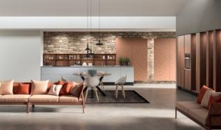 Una ricercata tonalità grigio opaco per le basi in HPL della cucina in linea Penelope di Aran Cucine; le colonne invece sono in HPL Brown Larch, mentre i pensili con anta aggettante sono nella finitura Corten Touch. Il piano di lavoro è in HPL stratificato argilla Cuore Colore. Lo schienale Copernico, nella stessa finitura dei pensili, è accessoriato con una serie di pensili e dettagli in alluminio nero. Un modulo base standard da 60 cm, prezzo a partire da 201 euro. www.arancucine.it Una ricercata tonalità grigio opaco per le basi in HPL della cucina in linea Penelope di Aran Cucine; le colonne invece sono in HPL Brown Larch, mentre i pensili con anta aggettante sono nella finitura Corten Touch. Il piano di lavoro è in HPL stratificato argilla Cuore Colore. Lo schienale Copernico, nella stessa finitura dei pensili, è accessoriato con una serie di pensili e dettagli in alluminio nero. Un modulo base standard da 60 cm, prezzo a partire da 201 euro. www.arancucine.it