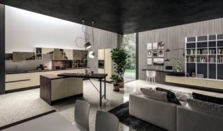 La composizione Mia di Aran Cucine dà vita ad una zona giorno unica e multifunzionale: infatti sono presenti una grande libreria sospesa coordinata con la cucina e uno scrittoio che consente di lavorare in smart working. Le ante delle basi sono effetto sabbia, quelle dei pensili nella finitura Vesuvio effetto malta, con un aspetto materico. Il top è in HPL Stratificato ruggine, mentre il piano snack asimmetrico è in E-wood abete nero. Un modulo base da 60 cm, prezzo a partire da 198 euro + IVA. www.arancucine.it La composizione Mia di Aran Cucine dà vita ad una zona giorno unica e multifunzionale: infatti sono presenti una grande libreria sospesa coordinata con la cucina e uno scrittoio che consente di lavorare in smart working. Le ante delle basi sono effetto sabbia, quelle dei pensili nella finitura Vesuvio effetto malta, con un aspetto materico. Il top è in HPL Stratificato ruggine, mentre il piano snack asimmetrico è in E-wood abete nero. Un modulo base da 60 cm, prezzo a partire da 198 euro + IVA. www.arancucine.it