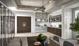 Ante lisce in rovere cuoio e a telaio laccate metallo bianco alluminio per la grande cucina Fabula di Rastelli. Sono presenti una serie di pensili e di colonne a vetro, con il telaio in metallo, che danno vita ad un ampio armadio-vetrina e illuminano l'ambiente. Il piano di lavoro e lo schienale in marmo bianco di Carrara impreziosiscono l'ambiente. Prezzo su richiesta. www.rastellidesign.it Ante lisce in rovere cuoio e a telaio laccate metallo bianco alluminio per la grande cucina Fabula di Rastelli. Sono presenti una serie di pensili e di colonne a vetro, con il telaio in metallo, che danno vita ad un ampio armadio-vetrina e illuminano l'ambiente. Il piano di lavoro e lo schienale in marmo bianco di Carrara impreziosiscono l'ambiente. Prezzo su richiesta. www.rastellidesign.it