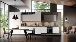 Design geometrico per la composizione Aria 3 di Arredo3 che è caratterizzata dalla presenza del blocco cottura, in cui è collocato anche il forno, su una base rialzata. Le ante lisce sono in laminato pet matt bianco e fango; il top e lo schienale sono in laminato pietra marrone. Le due colonne con un'altezza considerevole ne aumentano la capacità contenitiva e, grazie alla loro verticalità, completano armoniosamente la cucina. Prezzo su richiesta. www.arredo3.it Design geometrico per la composizione Aria 3 di Arredo3 che è caratterizzata dalla presenza del blocco cottura, in cui è collocato anche il forno, su una base rialzata. Le ante lisce sono in laminato pet matt bianco e fango; il top e lo schienale sono in laminato pietra marrone. Le due colonne con un'altezza considerevole ne aumentano la capacità contenitiva e, grazie alla loro verticalità, completano armoniosamente la cucina. Prezzo su richiesta. www.arredo3.it