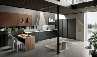 Le raffinate tonalità del nero per la composizione Erika di Aran Cucine che si sviluppa ad angolo e si apre sul living e che termina, lateralmente, con il piccolo tavolo snack nella finitura E-wood quercia. Le ante lisce delle basi e delle colonne sono in PET nero opaco che armonizzano con le gole gli zoccoli; i pensili a sviluppo verticale sono in LPL noce Caracalla. Un modulo base da 60 cm, prezzo a partire da 230 euro + IVA. www.arancucine.it Le raffinate tonalità del nero per la composizione Erika di Aran Cucine che si sviluppa ad angolo e si apre sul living e che termina, lateralmente, con il piccolo tavolo snack nella finitura E-wood quercia. Le ante lisce delle basi e delle colonne sono in PET nero opaco che armonizzano con le gole gli zoccoli; i pensili a sviluppo verticale sono in LPL noce Caracalla. Un modulo base da 60 cm, prezzo a partire da 230 euro + IVA. www.arancucine.it