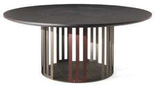 Il tavolo Klee di ETRO Home Interiors ha una forma scultorea realizzata artigianalmente: la base, con una finitura patinata realizzata a mano, è arricchita da una serie di elementi verniciati in una tonalità ciliegia. Il piano rotondo è in essenza Carbalho tinta wengé scuro opaco. Misura ø 180 x H 75 cm. www.jumbogroup.it Il tavolo Klee di ETRO Home Interiors ha una forma scultorea realizzata artigianalmente: la base, con una finitura patinata realizzata a mano, è arricchita da una serie di elementi verniciati in una tonalità ciliegia. Il piano rotondo è in essenza Carbalho tinta wengé scuro opaco. Misura ø 180 x H 75 cm. www.jumbogroup.it