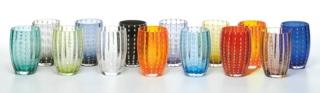 Sono realizzati interamente a mano in vetro colorato in massa i bicchieri Perle di Zafferano Tableware che sono frutto dell'unione fra antiche lavorazioni, come la spirale applicata e spezzata, e il design contemporaneo. La combinazione di trasparenze e pasta vitrea dà vita a pezzi di grande fascino. Sono disponibili in quattordici varianti di colore. Misurano Ø 7,1 x H 10,9 cm. Prezzo 22 euro cad. www.zafferanoitalia.com Sono realizzati interamente a mano in vetro colorato in massa i bicchieri Perle di Zafferano Tableware che sono frutto dell'unione fra antiche lavorazioni, come la spirale applicata e spezzata, e il design contemporaneo. La combinazione di trasparenze e pasta vitrea dà vita a pezzi di grande fascino. Sono disponibili in quattordici varianti di colore. Misurano Ø 7,1 x H 10,9 cm. Prezzo 22 euro cad. www.zafferanoitalia.com