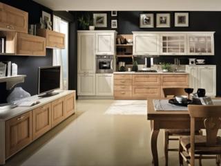 Rende la zona giorno “calda” e accogliente la cucina Bolgheri di Stosa che “dialoga” con il soggiorno attraverso i moduli coordinati con l'area operativa nei colori e nelle finiture Burro decapè e Rovere naturale. Lo stile piacevolmente retrò è sottolineato dalle ante modanate, dalle maniglie sagomate in metallo e dai pensili con i vetri all'inglese. L'alternanza fra pieni e vuoti alleggerisce la composizione. Un modulo base da 60 cm, prezzo a partire da 214 euro + IVA. www.stosacucine.com Rende la zona giorno “calda” e accogliente la cucina Bolgheri di Stosa che “dialoga” con il soggiorno attraverso i moduli coordinati con l'area operativa nei colori e nelle finiture Burro decapè e Rovere naturale. Lo stile piacevolmente retrò è sottolineato dalle ante modanate, dalle maniglie sagomate in metallo e dai pensili con i vetri all'inglese. L'alternanza fra pieni e vuoti alleggerisce la composizione. Un modulo base da 60 cm, prezzo a partire da 214 euro + IVA. www.stosacucine.com