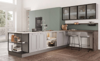 La cucina Agnese Style di Lube è composta da una penisola, attrezzata con il lavello e i fuochi, con le ante a telaio in laccato Grigio Traffico, da un'armadiatura con le ante lisce in melaminico Verde Marino e da una serie di pensili con le ante in vetro Extrachiaro. Lateralmente trova posto il bancone in laminato Rovere Grigio. Un modulo base da 60 cm senza top, prezzo 445 euro + IVA. www.cucinelube.it La cucina Agnese Style di Lube è composta da una penisola, attrezzata con il lavello e i fuochi, con le ante a telaio in laccato Grigio Traffico, da un'armadiatura con le ante lisce in melaminico Verde Marino e da una serie di pensili con le ante in vetro Extrachiaro. Lateralmente trova posto il bancone in laminato Rovere Grigio. Un modulo base da 60 cm senza top, prezzo 445 euro + IVA. www.cucinelube.it