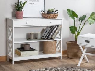 Stile country chic per il modello Montgomery di Beliani che è dotata di due ripiani che permettono di esporre in bella vista libri e oggetti e un grande cassetto sottopiano portatutto. La struttura lineare è realizzata in MDF verniciato bianco. Misura L 100 x P 30 x H 80 cm. Prezzo 149 euro. www.beliani.it Stile country chic per il modello Montgomery di Beliani che è dotata di due ripiani che permettono di esporre in bella vista libri e oggetti e un grande cassetto sottopiano portatutto. La struttura lineare è realizzata in MDF verniciato bianco. Misura L 100 x P 30 x H 80 cm. Prezzo 149 euro. www.beliani.it