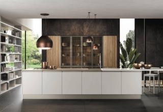 La cucina Aria di Febal Casa è dominata dalla grande isola rettangolare caratterizzata dalla presenza di ampie superfici di lavoro e dal piano snack coordinato che permette di consumare pasti veloci. Le ante lisce sono in tinta unita disponibili in laccato opaco, monoloccato lucido e melaminico e hanno la maniglia in testa. Gli zoccoli e i profili in metallo nella finitura Champagne si sposano con il calore del Noce gold dell'armadiatura a parete. Un modulo base da 60 cm prezzo a partire da 182,40 euro. www.febalcasa.com La cucina Aria di Febal Casa è dominata dalla grande isola rettangolare caratterizzata dalla presenza di ampie superfici di lavoro e dal piano snack coordinato che permette di consumare pasti veloci. Le ante lisce sono in tinta unita disponibili in laccato opaco, monoloccato lucido e melaminico e hanno la maniglia in testa. Gli zoccoli e i profili in metallo nella finitura Champagne si sposano con il calore del Noce gold dell'armadiatura a parete. Un modulo base da 60 cm prezzo a partire da 182,40 euro. www.febalcasa.com