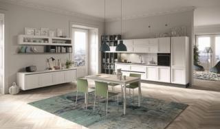 Pregiato legno massello di frassino, con una raffinata finitura laccato bianco, per le ante modanate del modello Magistra di Aran Cucine che si apre completamente sul living arredato con elementi sospesi coordinati. La gola e lo zoccolo grigi, coordinati con i vani a giorno, scandiscono la composizione. Sulla parete di fondo si sviluppa linearmente l'intera cucina; alle estremità trovano posto le colonne con gli elettrodomestici e un grande scaffale. Un modulo base da 60 cm in Laccato Lucido prezzo a partire da 294 euro + IVA. www.arancucine.it Pregiato legno massello di frassino, con una raffinata finitura laccato bianco, per le ante modanate del modello Magistra di Aran Cucine che si apre completamente sul living arredato con elementi sospesi coordinati. La gola e lo zoccolo grigi, coordinati con i vani a giorno, scandiscono la composizione. Sulla parete di fondo si sviluppa linearmente l'intera cucina; alle estremità trovano posto le colonne con gli elettrodomestici e un grande scaffale. Un modulo base da 60 cm in Laccato Lucido prezzo a partire da 294 euro + IVA. www.arancucine.it