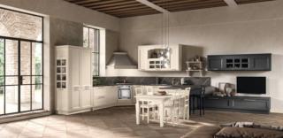 Ispirazione classica per la cucina Beverly di Stosa che è caratterizzata da una zona cottura angolare con il forno basso, i fuochi e la cappa a camino in metallo Bianco con cornice in legno. Le basi e le colonne hanno le ante piene realizzate in Frassino Crema; i pensili con le ante a telaio in vetro all'inglese ne sottolineano lo stile piacevolmente retrò. Il piano e l'alzatina sono in laminato Pulipis Dark. La composizione si collega agli elementi in Frassino Lava. Un modulo base da 60 cm, prezzo a partire da 199 euro + IVA. www.stosa.it Ispirazione classica per la cucina Beverly di Stosa che è caratterizzata da una zona cottura angolare con il forno basso, i fuochi e la cappa a camino in metallo Bianco con cornice in legno. Le basi e le colonne hanno le ante piene realizzate in Frassino Crema; i pensili con le ante a telaio in vetro all'inglese ne sottolineano lo stile piacevolmente retrò. Il piano e l'alzatina sono in laminato Pulipis Dark. La composizione si collega agli elementi in Frassino Lava. Un modulo base da 60 cm, prezzo a partire da 199 euro + IVA. www.stosa.it