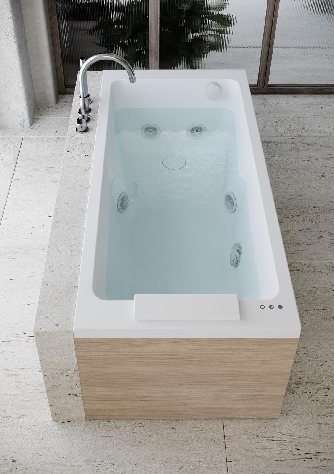 La vasca idromassaggio Sharp 75 di Jacuzzi® è dotata di 4 bocchette TargetPro® per un idromassaggio personalizzato e 4 bocchette Twirl per l’idromassaggio dorsale. Ha poggiatesta rimovibile, rainbow e luce di cortesia, Clean System automatico e comandi touch. Misura L 170 x P 75 cm. Prezzo a partire da 3.400 euro. www.jacuzzi.com