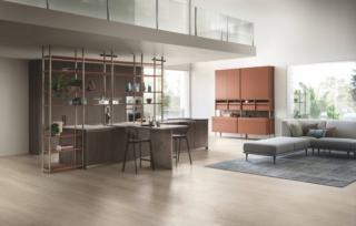 Una struttura modulare a giorno che si integra perfettamente nella grande isola centrale, attrezzata con fuochi e lavello e dotata di bancone snack, per la nuova cucina Formalia di Scavolini: permette di esporre stoviglie e accessori a vista dando vita ad un collegamento con il living. Le ante delle basi, sagomate e dotate di maniglie in metallo con profilo titanio, sono realizzate in decorativo Noce Arabica che crea un piacevole contrasto con la madia in laccato opaco Ruggine. Prezzo su richiesta. www.scavolini.com Una struttura modulare a giorno che si integra perfettamente nella grande isola centrale, attrezzata con fuochi e lavello e dotata di bancone snack, per la nuova cucina Formalia di Scavolini: permette di esporre stoviglie e accessori a vista dando vita ad un collegamento con il living. Le ante delle basi, sagomate e dotate di maniglie in metallo con profilo titanio, sono realizzate in decorativo Noce Arabica che crea un piacevole contrasto con la madia in laccato opaco Ruggine. Prezzo su richiesta. www.scavolini.com