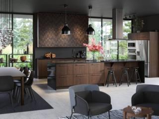 Una calda tonalità marrone per le ante Sinarp, impiallacciate in rovere, della cucina di Ikea Italia che si articola intorno alla lunga isola divisa in tre zone: lavaggio, cottura con l'ampio piano ad induzione e pranzo grazie al piano aggettante e agli sgabelli. I pensili, che raggiungono il soffitto per ottimizzare lo spazio, sono chiusi dalle ante Hasslarp con un decoro geometrico a spina di pesce  La composizione tipo misura L 240 x P 64 x H 228 cm e costa 1.449 euro (inclusi 4 elettrodomestici). www.ikea.com Una calda tonalità marrone per le ante Sinarp, impiallacciate in rovere, della cucina di Ikea Italia che si articola intorno alla lunga isola divisa in tre zone: lavaggio, cottura con l'ampio piano ad induzione e pranzo grazie al piano aggettante e agli sgabelli. I pensili, che raggiungono il soffitto per ottimizzare lo spazio, sono chiusi dalle ante Hasslarp con un decoro geometrico a spina di pesce  La composizione tipo misura L 240 x P 64 x H 228 cm e costa 1.449 euro (inclusi 4 elettrodomestici). www.ikea.com