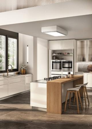 Nella cucina Carattere di Scavolini, design Vuesse, i frontali in laccato lucido Bianco Prestige dialogano con le ante a telaio con vetro Bronzo trasparente. In armonia cromatica, il marmo Fior di Pesco Carnico - scelto per lo schienale e il piano in marmo sul fondo -, l'Acciaio Satinato utilizzato nella zona lavaggio e l'impiallacciato Rovere Nordic nel banco colazione. www.scavolini.com Nella cucina Carattere di Scavolini, design Vuesse, i frontali in laccato lucido Bianco Prestige dialogano con le ante a telaio con vetro Bronzo trasparente. In armonia cromatica, il marmo Fior di Pesco Carnico - scelto per lo schienale e il piano in marmo sul fondo -, l'Acciaio Satinato utilizzato nella zona lavaggio e l'impiallacciato Rovere Nordic nel banco colazione. www.scavolini.com