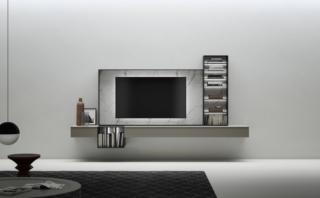 La cornice TV di Caccaro in kera poggia su due basi Wallover sospese, con ribalta e cassetto, e una libreria con schiena illuminata. Una seconda libreria laterale, con i ripiani a passo irregolare, crea una tensione verticale che alleggerisce questa soluzione per la zona giorno. Una composizione flessibile, personalizzabile nelle dimensioni, nelle finiture e nella disposizione dei moduli, che rompe gli schemi della classica parete attrezzata creando un nuovo concetto di mobile TV. Misura L 300 x P 45,5 x H 156,6 cm. È declinata nelle finiture kera invisible white, laccato opaco nero stout e fumo. Prezzo a partire da 3.718 euro + iva. http://www.caccaro.com La cornice TV di Caccaro in kera poggia su due basi Wallover sospese, con ribalta e cassetto, e una libreria con schiena illuminata. Una seconda libreria laterale, con i ripiani a passo irregolare, crea una tensione verticale che alleggerisce questa soluzione per la zona giorno. Una composizione flessibile, personalizzabile nelle dimensioni, nelle finiture e nella disposizione dei moduli, che rompe gli schemi della classica parete attrezzata creando un nuovo concetto di mobile TV. Misura L 300 x P 45,5 x H 156,6 cm. È declinata nelle finiture kera invisible white, laccato opaco nero stout e fumo. Prezzo a partire da 3.718 euro + iva. http://www.caccaro.com