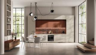 Scenografica ed elegante la cucina Mira di Scavolini è caratterizzata da uno sviluppo lineare; le ante delle basi, delle colonne e dei pensili sono in laccato dogato opaco Tortora, mentre quelle dei pensili sono in laccato opaco Ruggine che “illumina” l'intera composizione. Il piano cucina in Quarzite Brown Chocolate è dotato di zona cottura e lavaggio. Prezzo su richiesta. www.scavolini.com Scenografica ed elegante la cucina Mira di Scavolini è caratterizzata da uno sviluppo lineare; le ante delle basi, delle colonne e dei pensili sono in laccato dogato opaco Tortora, mentre quelle dei pensili sono in laccato opaco Ruggine che “illumina” l'intera composizione. Il piano cucina in Quarzite Brown Chocolate è dotato di zona cottura e lavaggio. Prezzo su richiesta. www.scavolini.com