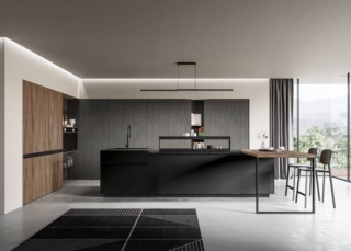 Ha le basi con ante in PET riciclato Stromboli opaco la cucina Kalì 05 di Arredo3 che è completata dai moduli Maxxi delle colonne in laminato noce Imperial con maniglie Quadra che simulano un effetto gola orizzontale. Le ampie colonne in laminato metal light, effetto ferro ossidato, hanno una ampliata capacità di contenimento grazie al meccanismo Tandem Side, che attrezza e organizza anche l'interno dell'anta. Il piano dell'isola è in ceramica Iris dark Marquina. Prezzo su richiesta. www.arredo3.it Ha le basi con ante in PET riciclato Stromboli opaco la cucina Kalì 05 di Arredo3 che è completata dai moduli Maxxi delle colonne in laminato noce Imperial con maniglie Quadra che simulano un effetto gola orizzontale. Le ampie colonne in laminato metal light, effetto ferro ossidato, hanno una ampliata capacità di contenimento grazie al meccanismo Tandem Side, che attrezza e organizza anche l'interno dell'anta. Il piano dell'isola è in ceramica Iris dark Marquina. Prezzo su richiesta. www.arredo3.it