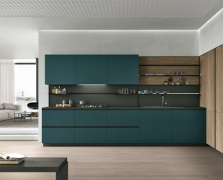 Dà vita ad un'atmosfera fresca la cucina Metropolis di Stosa che ha le ante delle basi e dei pensili  in Fenix Blu Shaba che crea un raffinato contrasto con il Noce Eucalipto di quelle delle colonne che “vestono” la parete e incorniciano il tavolo e le vetrine per le stoviglie. Le maniglie nere Linear scandiscono la superficie; la boiserie in Fenix Nero Ingo con mensole in metallo permette di sfuttare lo spazio fra il piano e i pensili. Un modulo base da 60 cm, prezzo a partire da 219 euro + IVA. www.stosacucine.com Dà vita ad un'atmosfera fresca la cucina Metropolis di Stosa che ha le ante delle basi e dei pensili  in Fenix Blu Shaba che crea un raffinato contrasto con il Noce Eucalipto di quelle delle colonne che “vestono” la parete e incorniciano il tavolo e le vetrine per le stoviglie. Le maniglie nere Linear scandiscono la superficie; la boiserie in Fenix Nero Ingo con mensole in metallo permette di sfuttare lo spazio fra il piano e i pensili. Un modulo base da 60 cm, prezzo a partire da 219 euro + IVA. www.stosacucine.com