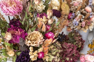 Dried flowers arrangement close up. Sustainable floristry. Home decor with dried flowers. Dried flowers arrangement close up. Sustainable floristry. Home decor with dried flowers.